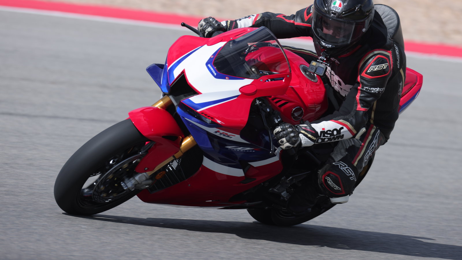 A motorcycle being ridden on a racing track